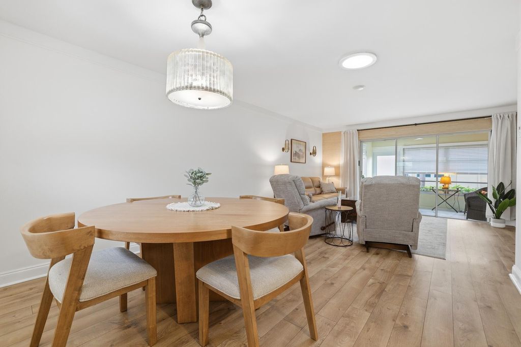 Photo of 644 Marlboro Oval, Lake Worth, FL 33467 (MLS # B26011379)