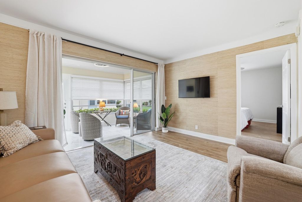 Photo of 644 Marlboro Oval, Lake Worth, FL 33467 (MLS # B26011379)