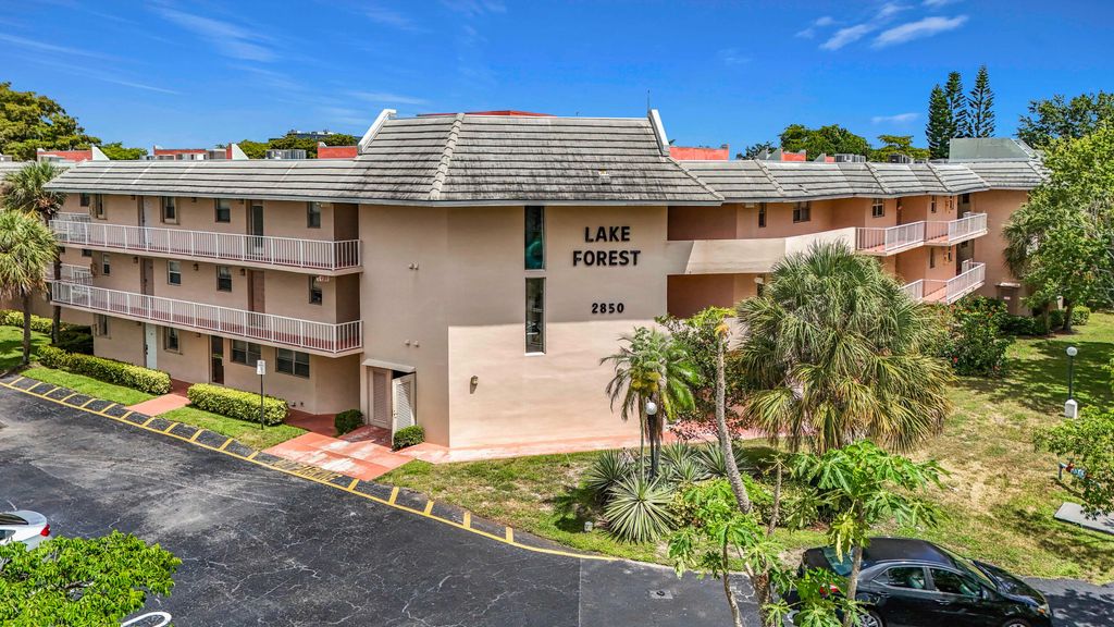 Photo of 2850 Forest Hills Boulevard #212, Coral Springs, FL 33065 (MLS # B26043924)