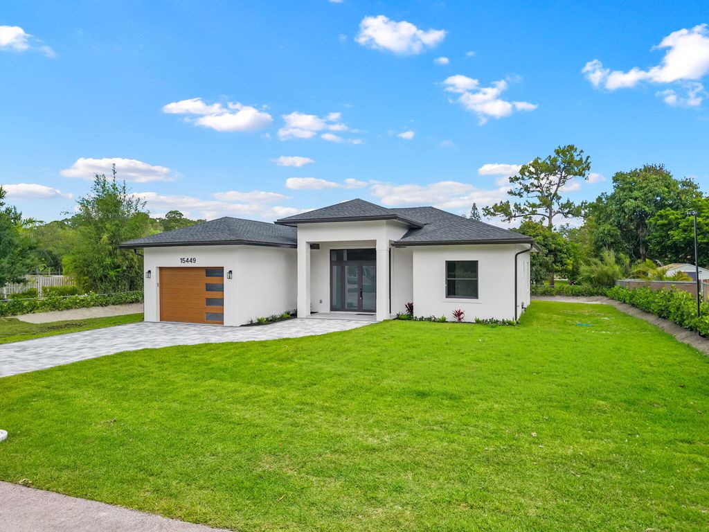 Photo of 15449 Los Angeles Drive, Loxahatchee Groves, FL 33470 (MLS # B26019291)