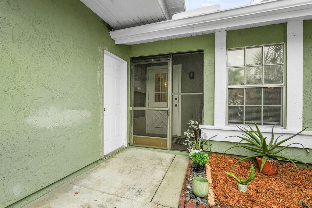 Photo of 1721 SE Balmoral Court, Port Saint Lucie, FL 34952 (MLS # R11147785)