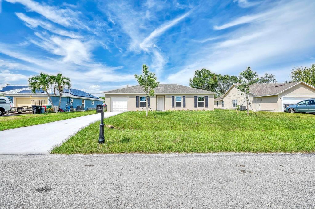 Photo of 2457 SE Tracy Avenue, Port Saint Lucie, FL 34952 (MLS # F10401624)