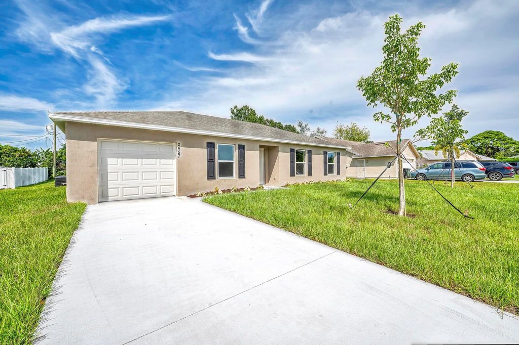 Photo of 2457 SE Tracy Avenue, Port Saint Lucie, FL 34952 (MLS # F10401624)