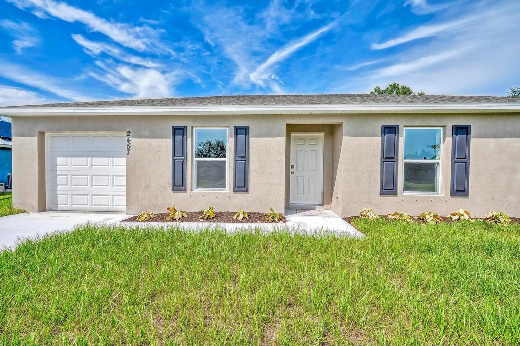 Photo of 2457 SE Tracy Avenue, Port Saint Lucie, FL 34952 (MLS # F10401624)