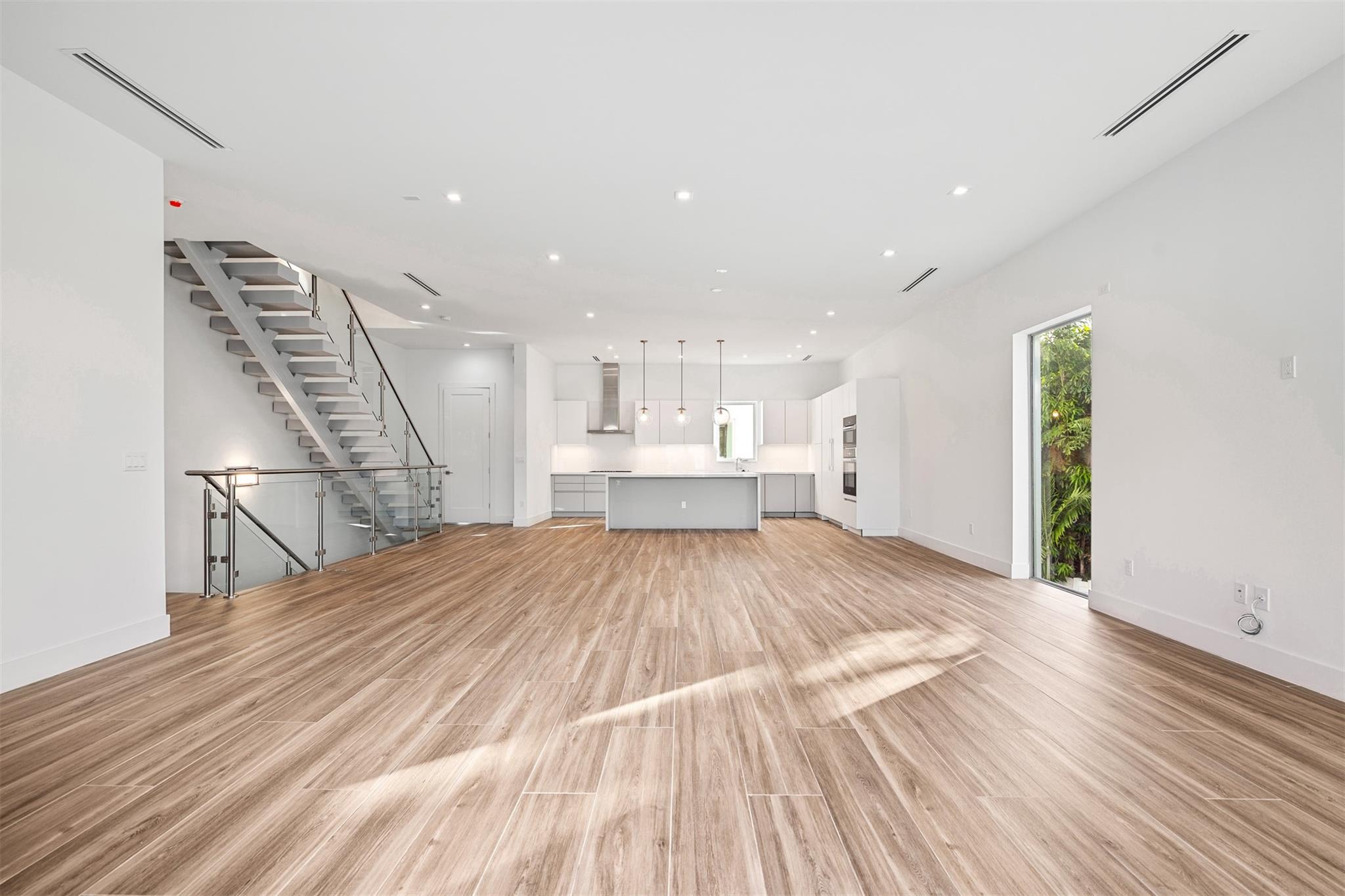This never-lived-in corner unit townhome offers unparalleled luxury with a private elevator and pool. Ready for immediate occupancy, this new construction features: secure gated entry, large walk-in closets, a custom European kitchen with top-of-the-line Miele and Samsung appliances, soaring 10-10.5ft ceilings, and two primary bedrooms; one on the first floor and one on the third floor. Enjoy a spacious balcony, a two-car garage, and exclusive private bicycle racks. Located just two blocks from the famed Las Olas Blvd and two miles from Las Olas Beach, it’s designed with home automation, LED lighting, water and air filtration systems, and a natural gas tankless water heater. Experience 5-star resort living in the heart of Fort Lauderdale.