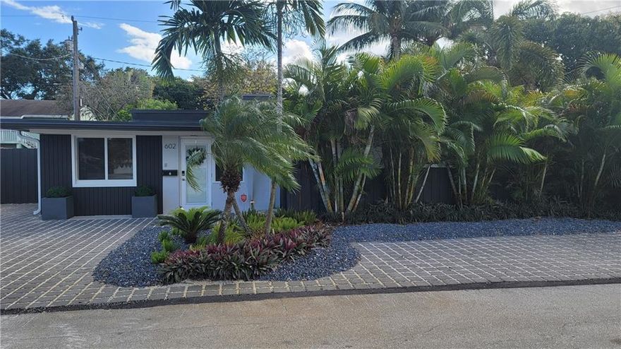 An amazing opportunity to own a Fully-furnished remodeled duplex just four blocks from the center of Wilton Drive. This turnkey home features two units with updated bed/bath, king/queen bed, washer/dryer, dishwasher and more. Four Smart TV's.  Home was just updated including impact windows. Both units include full package appliances, a stove, dishwasher, and fridge alongside dishes, silverware, cookware, and more. Outdoor Spa and shower in the rear unit.  Are you ready for your next home? Looking for immediate cash flow? Vacation Rental?  Live in one unit and rent the other? Don't miss the chance to call this versatile property your own.  New parking area with parking for 5 cars.