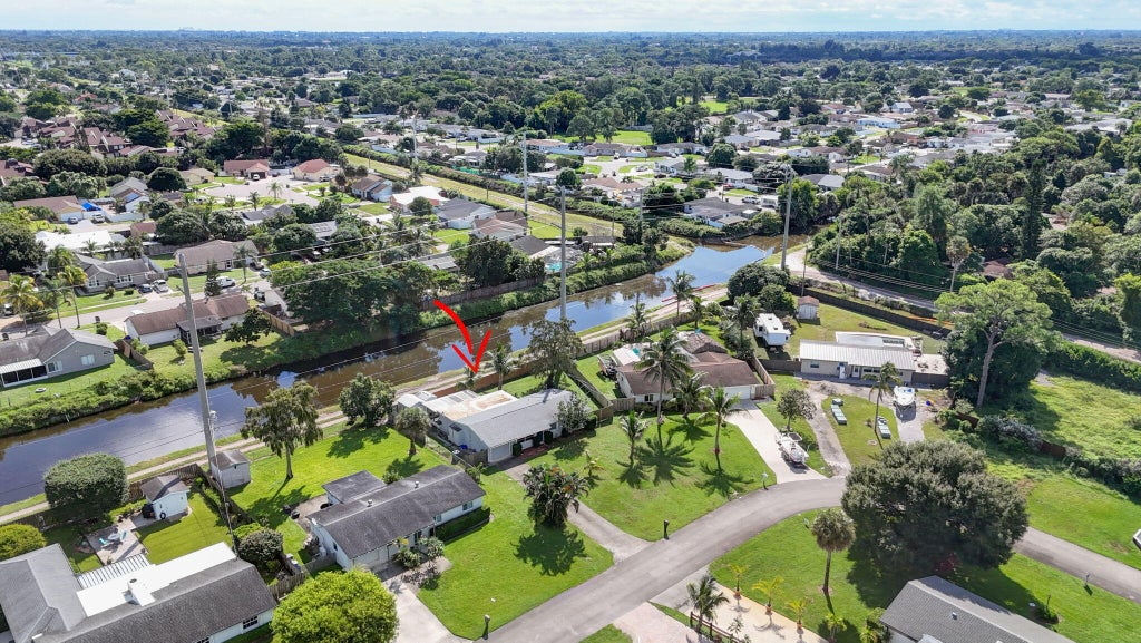 Photo of 446 E SHADYSIDE Circle, West Palm Beach, FL 33415 (MLS # B26088922)