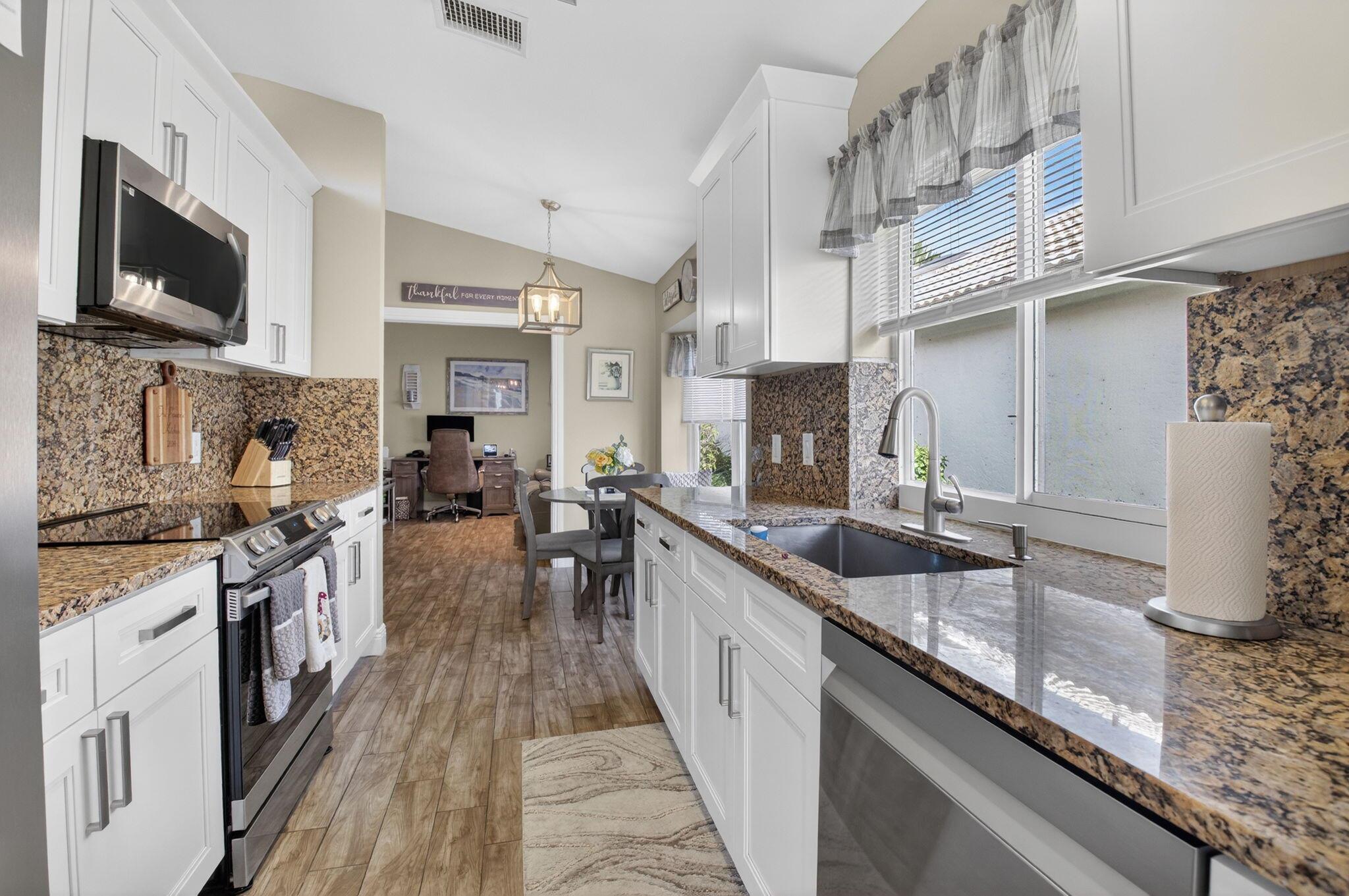 SAWGRASS LAKES HOMES; Lak - Residential