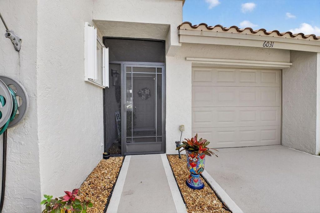 Photo of 6031 Bay Isles Drive, Boynton Beach, FL 33437 (MLS # R11148016)