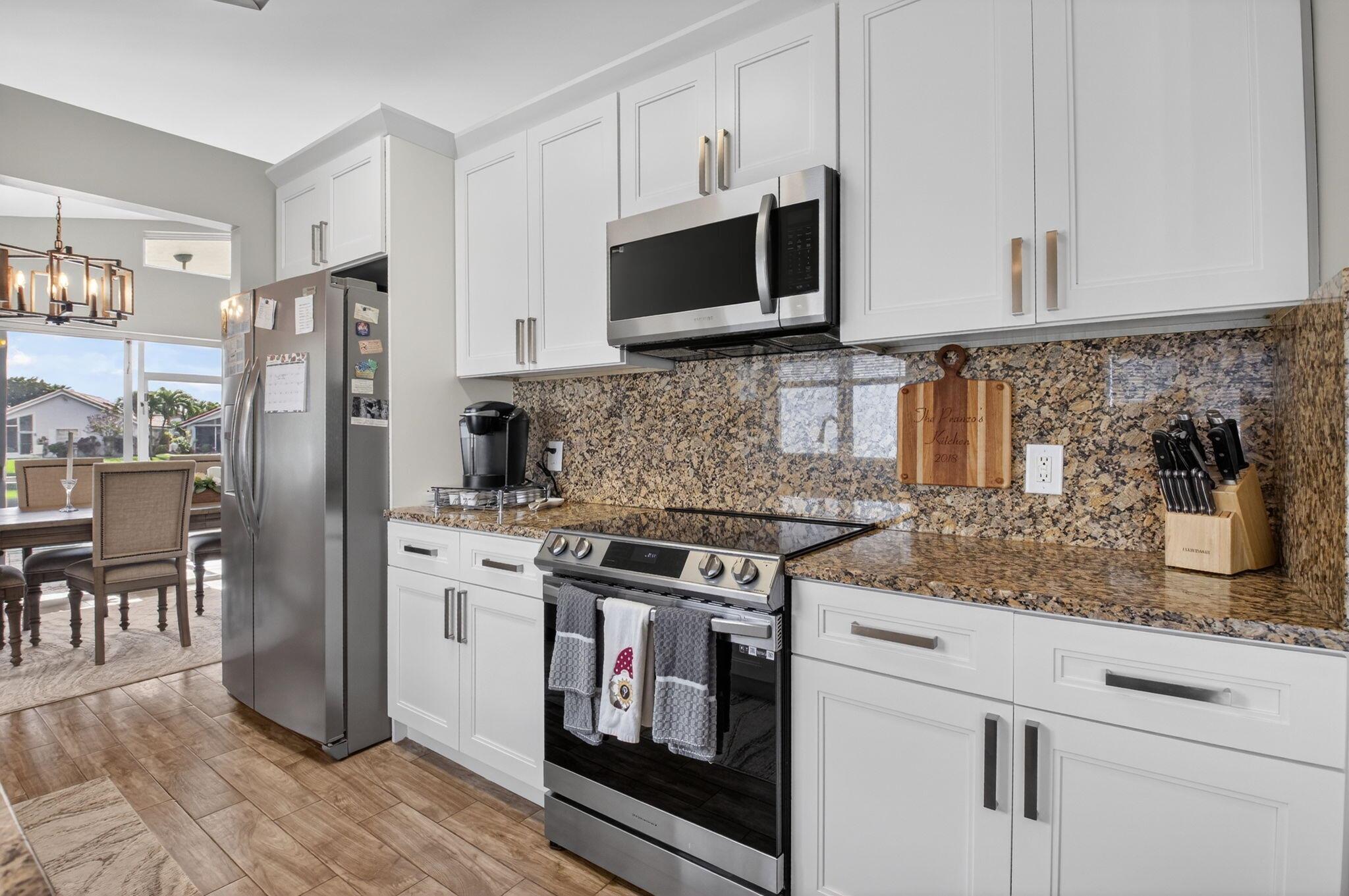 SAWGRASS LAKES HOMES; Lak - Residential