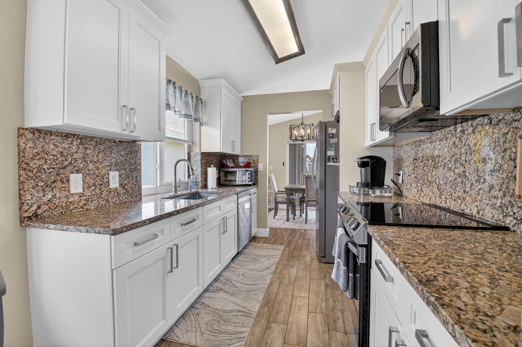 SAWGRASS LAKES HOMES; Lak - Residential