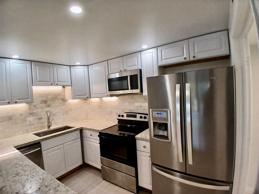 Photo of 4164 N Inverrary Drive #311, Lauderhill, FL 33319 (MLS # F10549069)