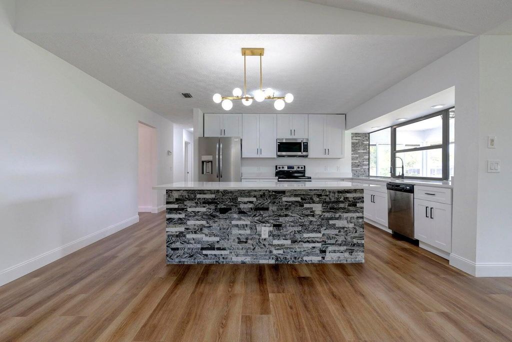 Photo of 2381 SE Aneci Street, Port Saint Lucie, FL 34984 (MLS # R11102905)