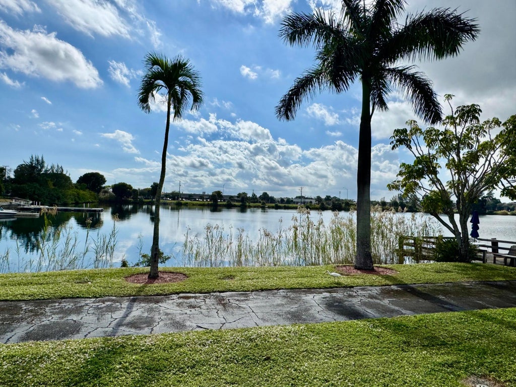 Photo of 960 CRYSTAL LAKE DR #206, Deerfield Beach, FL 33064 (MLS # B26078101)