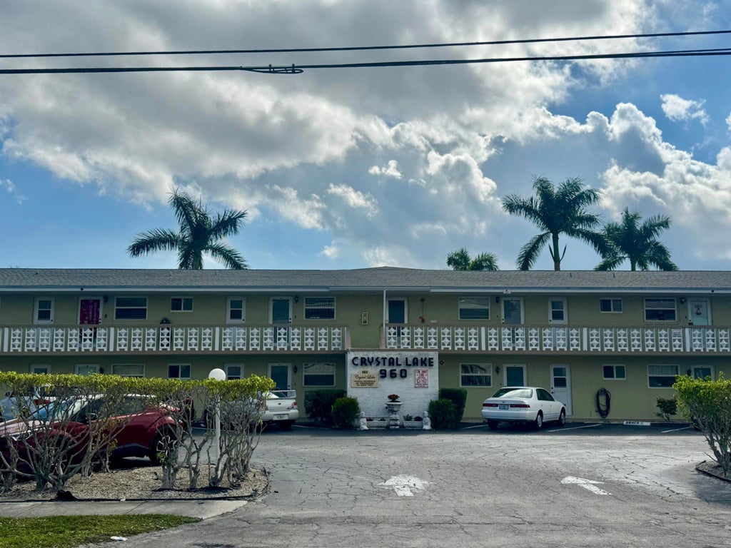 Photo of 960 CRYSTAL LAKE DR #206, Deerfield Beach, FL 33064 (MLS # B26078101)