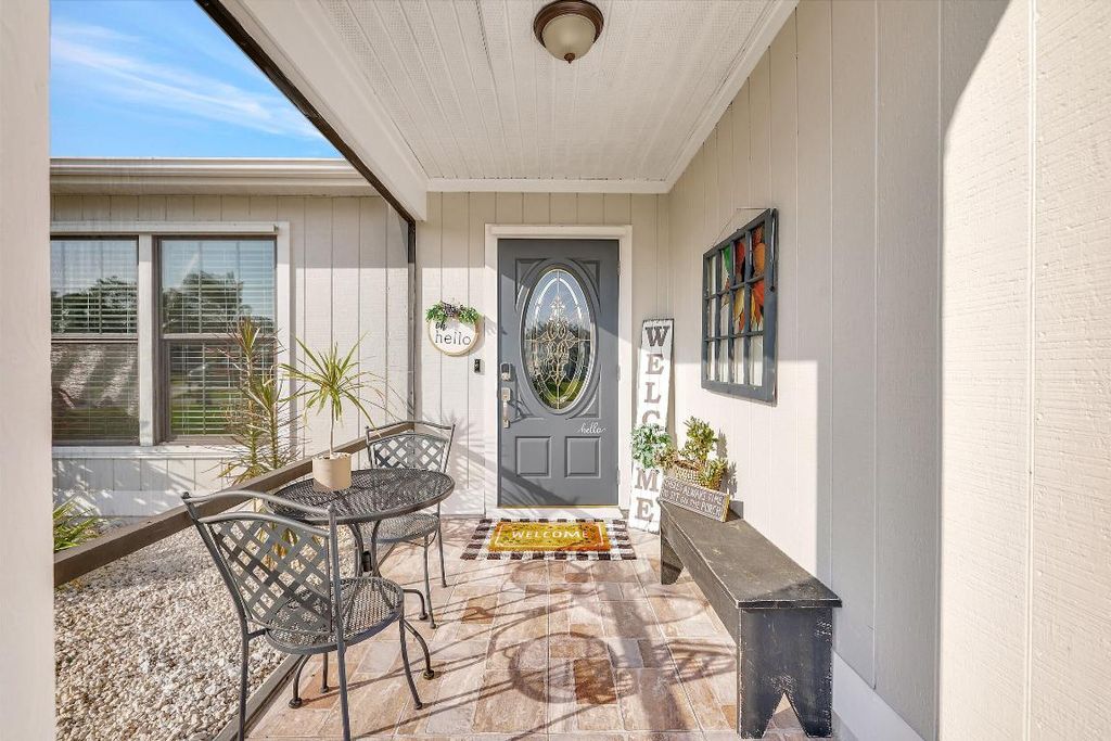 Photo of 279 SW Langfield Avenue, Port Saint Lucie, FL 34984 (MLS # R10968652)