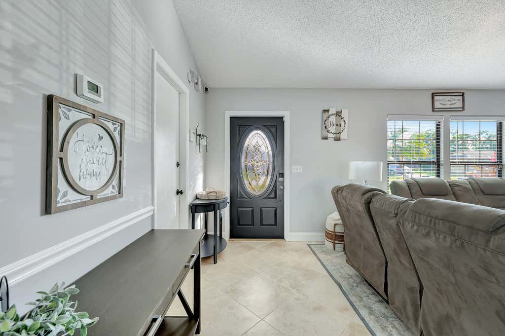 Photo of 279 SW Langfield Avenue, Port Saint Lucie, FL 34984 (MLS # R10968652)