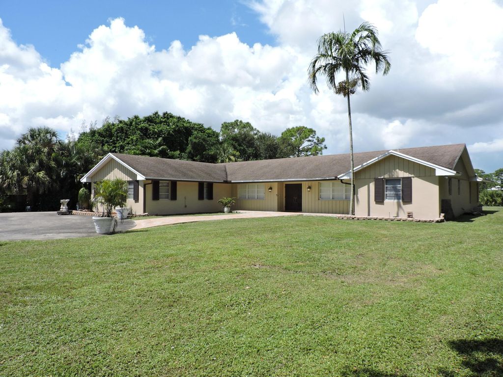 Photo of 4529 Square Lake Drive, Palm Beach Gardens, FL 33418 (MLS # R11044904)