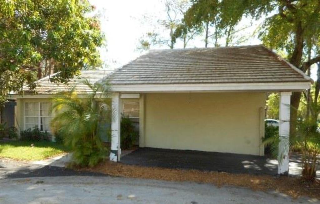 Photo of 1251 NW 89th Dr, Coral Springs, FL 33071 (MLS # F10532750)