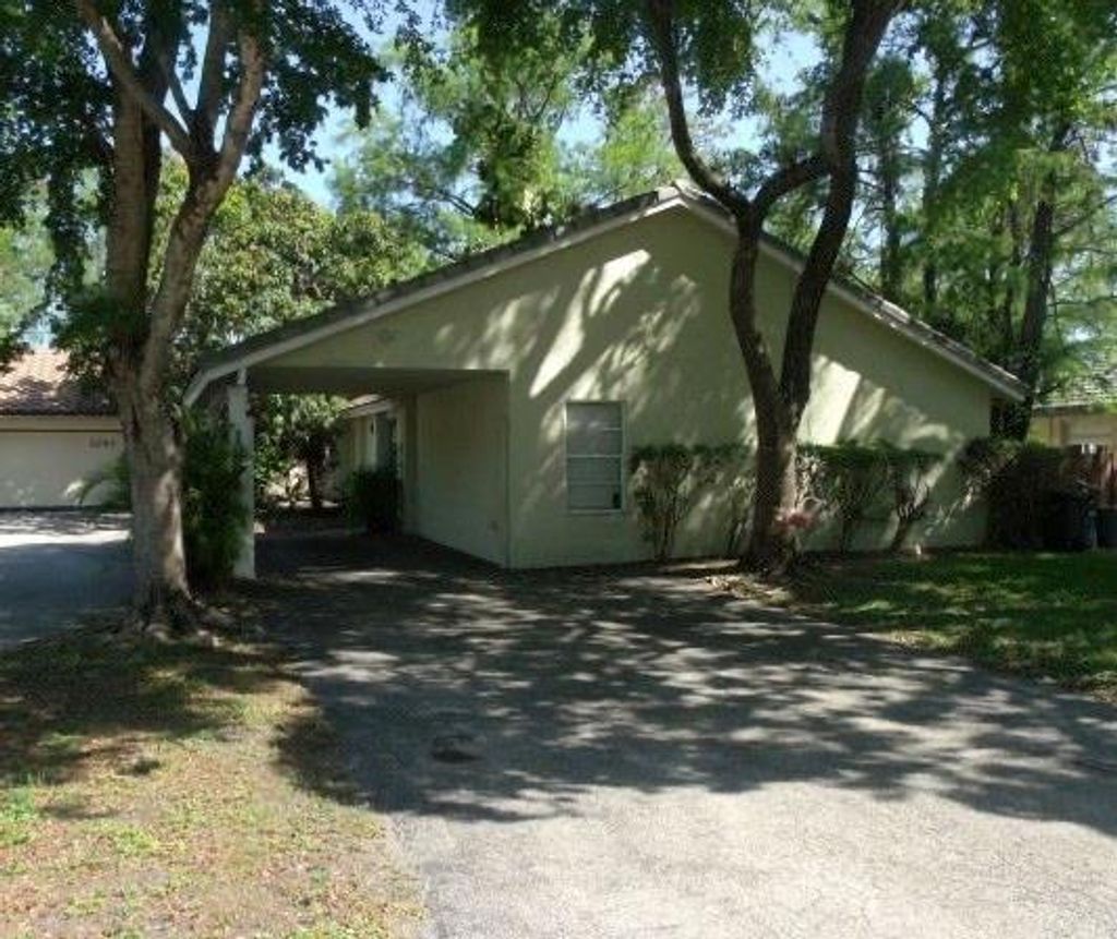 Photo of 1251 NW 89th Dr, Coral Springs, FL 33071 (MLS # F10532750)