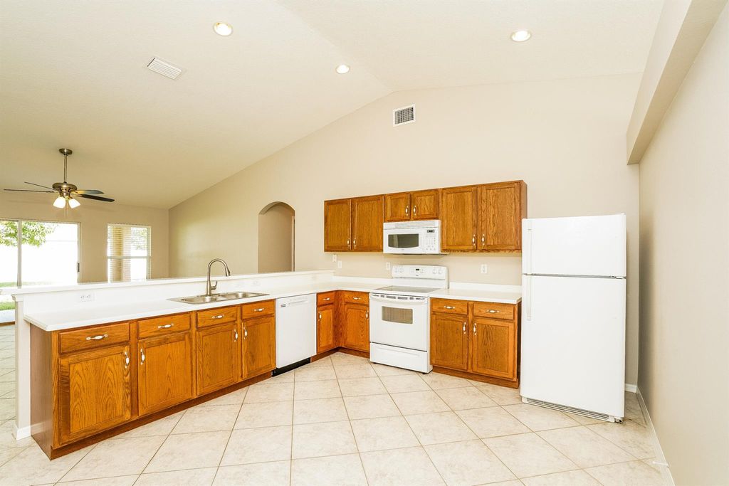 Photo of 549 SE Crosspoint Drive, Port Saint Lucie, FL 34983 (MLS # R11010924)