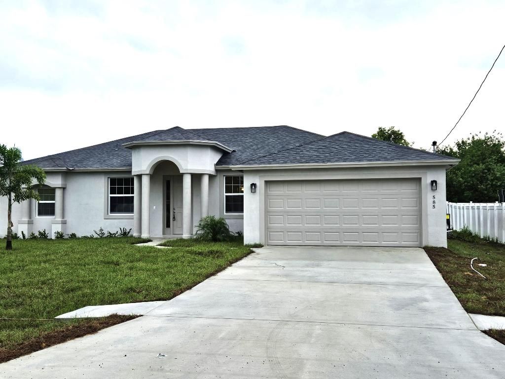Photo of 585 SW Jeanne Avenue, Port Saint Lucie, FL 34953 (MLS # R10996683)
