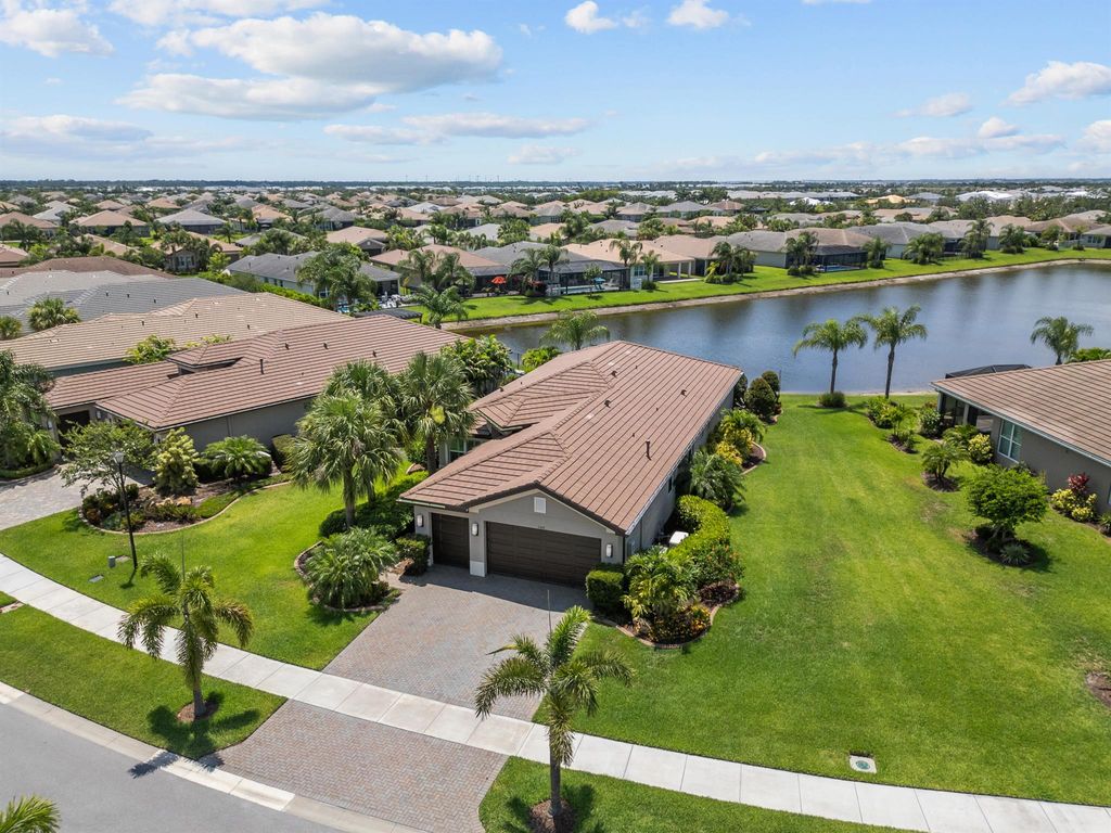 Photo of 11402 SW Half Moon Lake Lane, Port Saint Lucie, FL 34987 (MLS # R10997529)