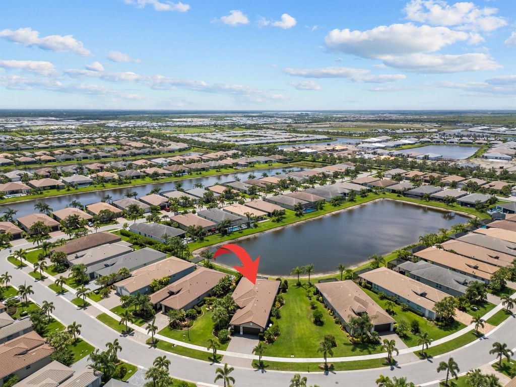 Photo of 11402 SW Half Moon Lake Lane, Port Saint Lucie, FL 34987 (MLS # R10997529)