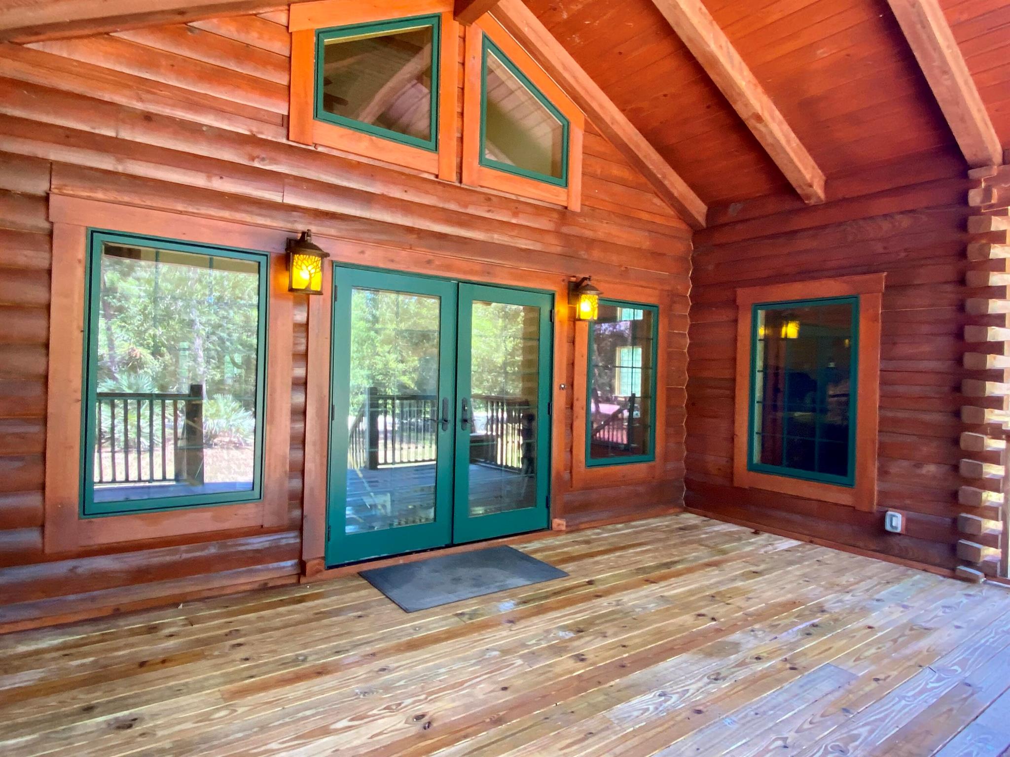 One of the most coveted areas in Jupiter Farms this home backs up to 12,000 acres of preserves. This custom built unique home made from Tidewater Red Cypress wood which is impervious to any kind of insect boring has 4 bedrooms 3 bathrooms 2 car garage plus 1,000 sq ft above garage bonus room with high vaulted ceilings is ready for the growing family. Deer and other wildlife can be seen right from your living room with 20'+ high ceilings with floor to ceiling high windows. This 2018 home has complete impact glass windows & doors and an exceptional floor plans with huge walk in closets for each bedroom, open kitchen with large family room, downstairs and upstairs living rooms, charming front and back porches. HOME IS OWNER OCCUPIED. PLS DO NOT WALK ON THE PROPERTY