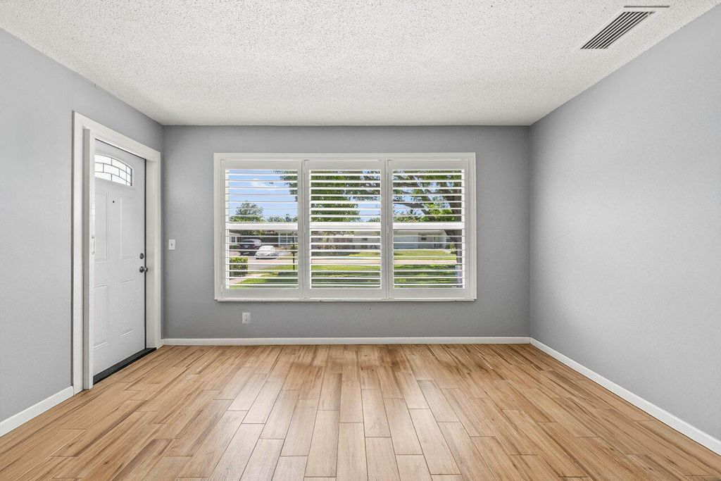 Photo of 7376 W Oakridge Circle #C, Lake Worth, FL 33462 (MLS # R11163034)