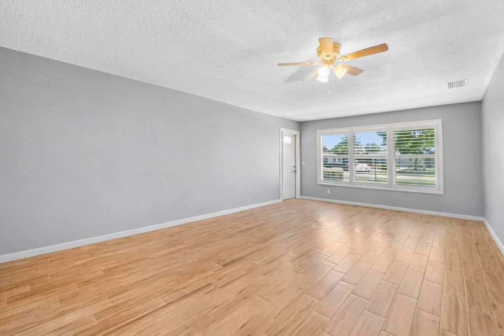 Photo of 7376 W Oakridge Circle #C, Lake Worth, FL 33462 (MLS # R11163034)