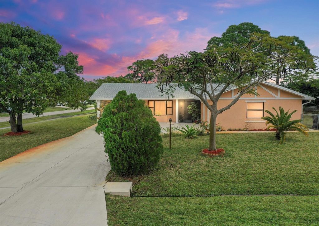 Photo of 197 NW Peach Street, Port Saint Lucie, FL 34983 (MLS # R10950175)