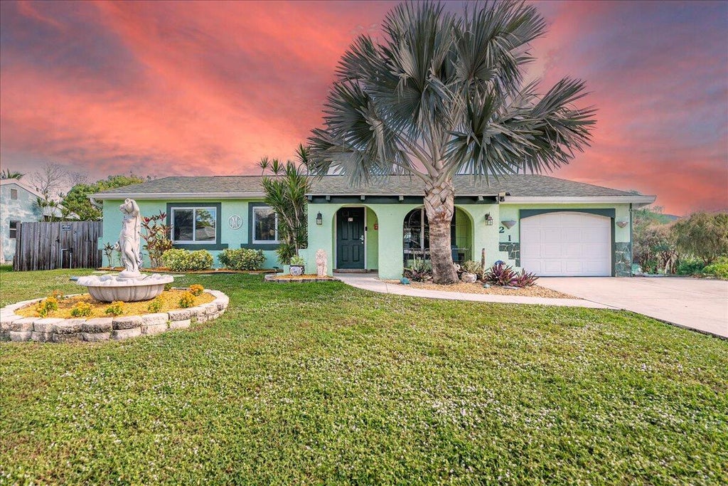 Photo of 1821 SE Manth Lane, Port Saint Lucie, FL 34983 (MLS # R11046399)