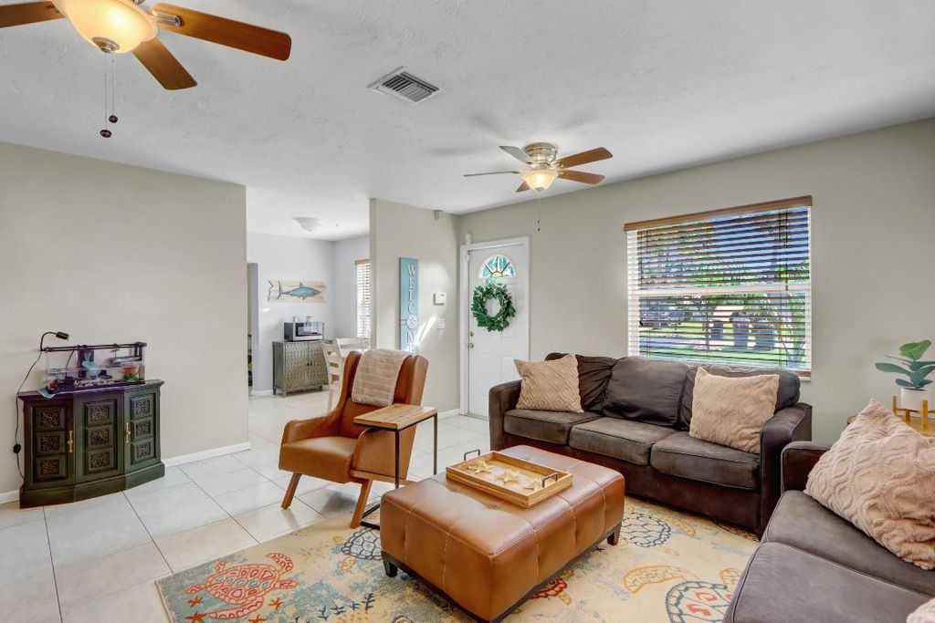 Photo of 317 Perry Avenue, Greenacres, FL 33463 (MLS # R11129424)