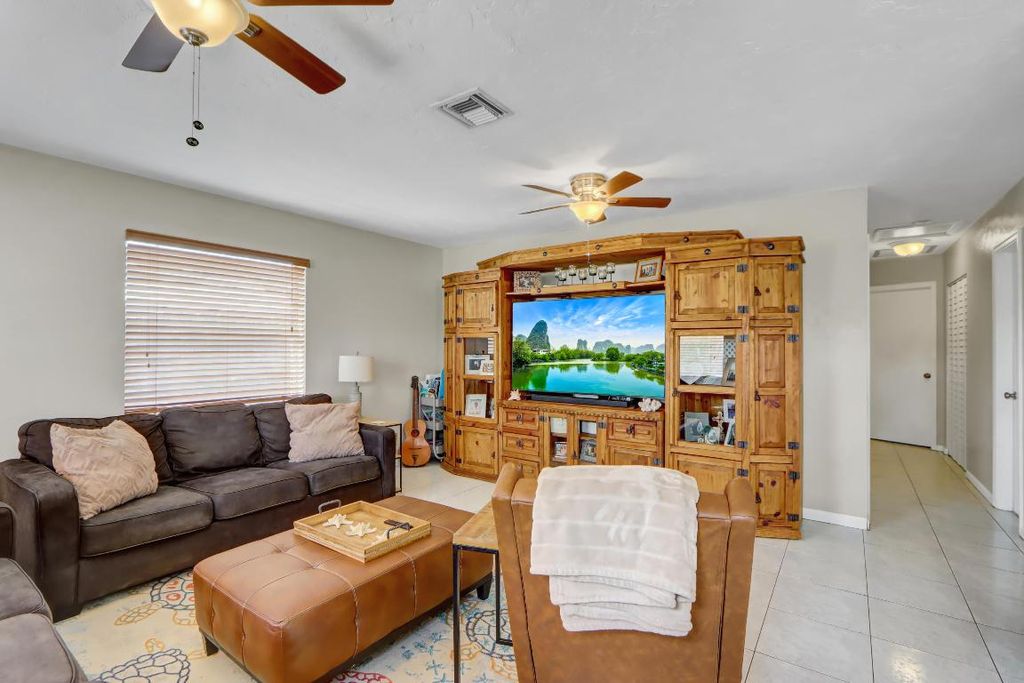 Photo of 317 Perry Avenue, Greenacres, FL 33463 (MLS # R11129424)