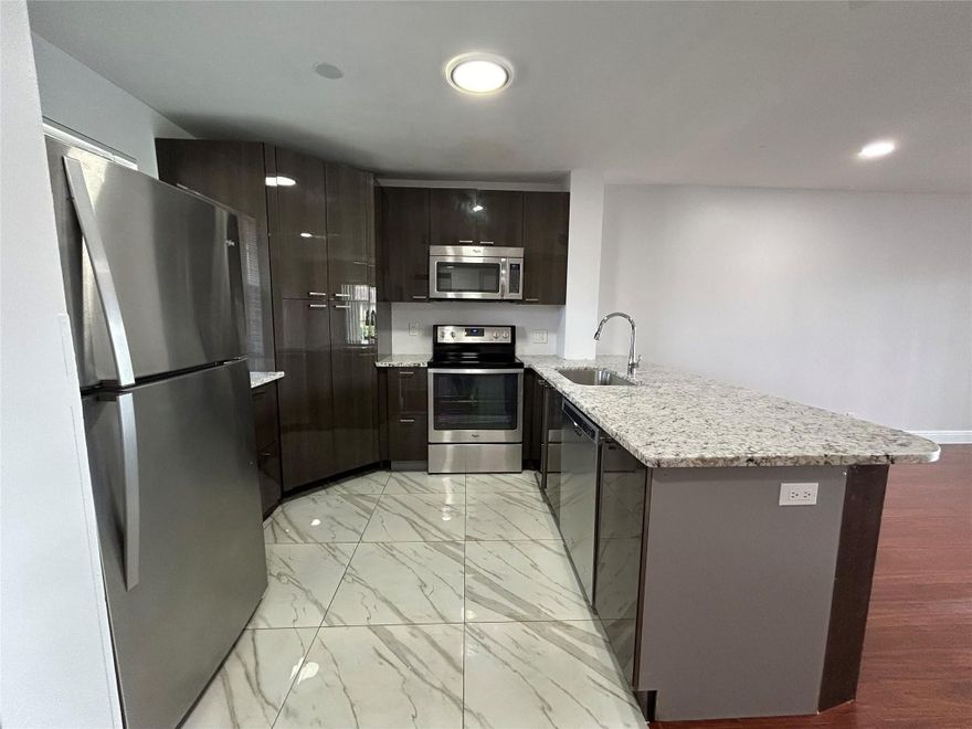 Wonderful Garden Condo in a clean quiet community! Overlooks the lake and pool House! Move-in ready!!!