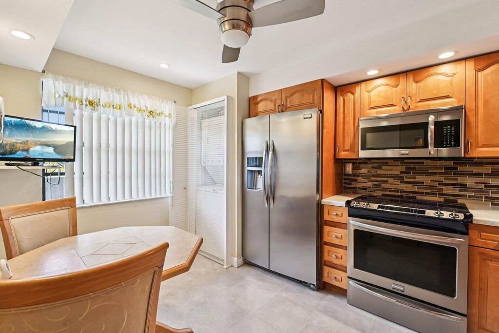 Photo of 1101 Colony Point Circle #404, Pembroke Pines, FL 33026 (MLS # B26008098)