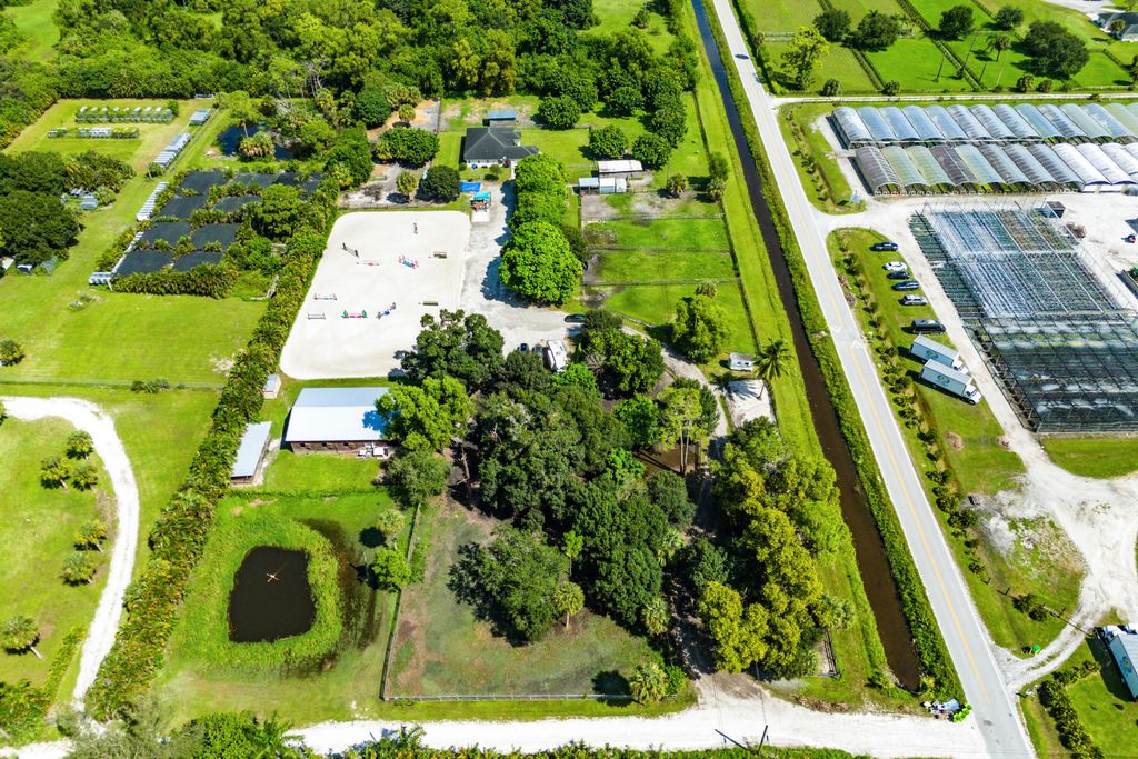 Photo of 3479 D Road, Loxahatchee Groves, FL 33470 (MLS # B26009196)