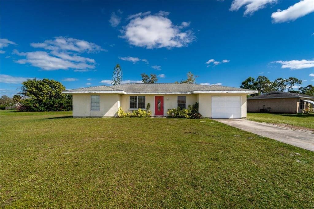 Photo of 2001 SE Talwood Lane, Port St Lucie, FL 34952 (MLS # R10864639)