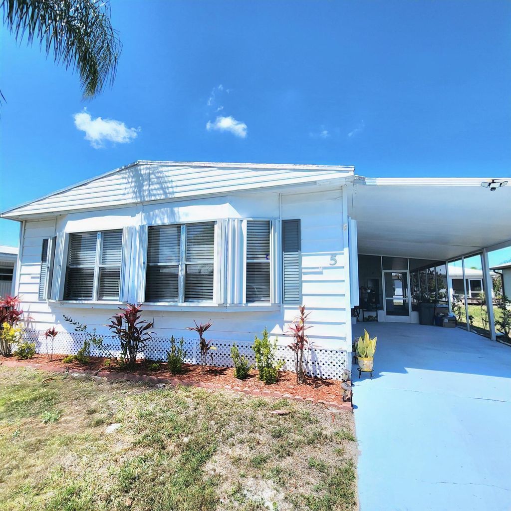 Photo of 5 El Portal Lane, Port Saint Lucie, FL 34952 (MLS # B26008242)