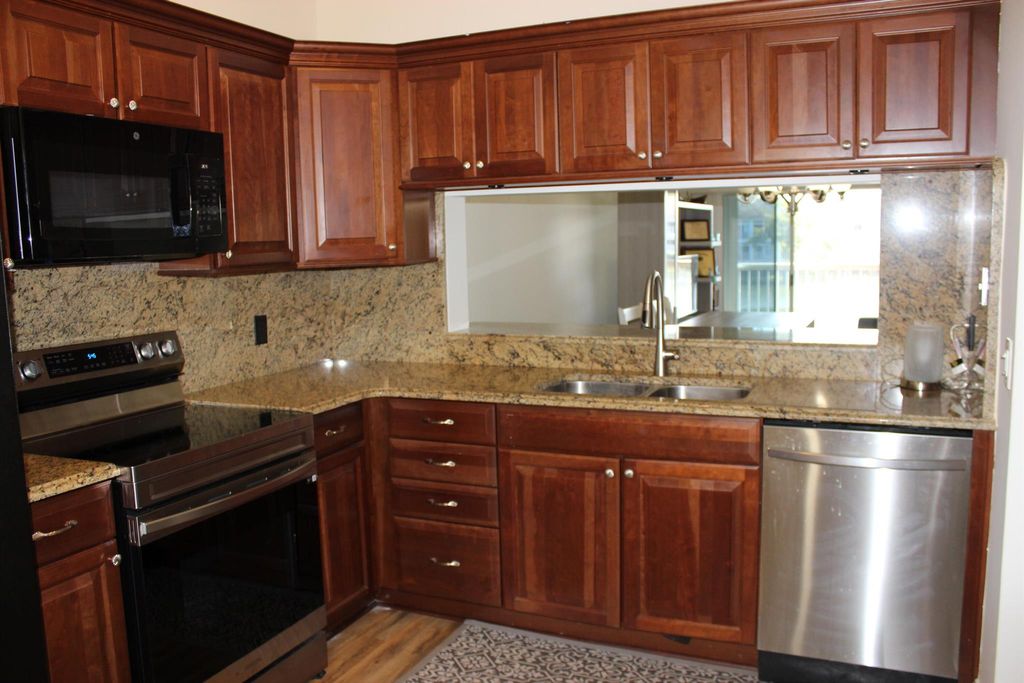 Photo of 217 Cypress Point Drive #217, Palm Beach Gardens, FL 33418 (MLS # R10933344)