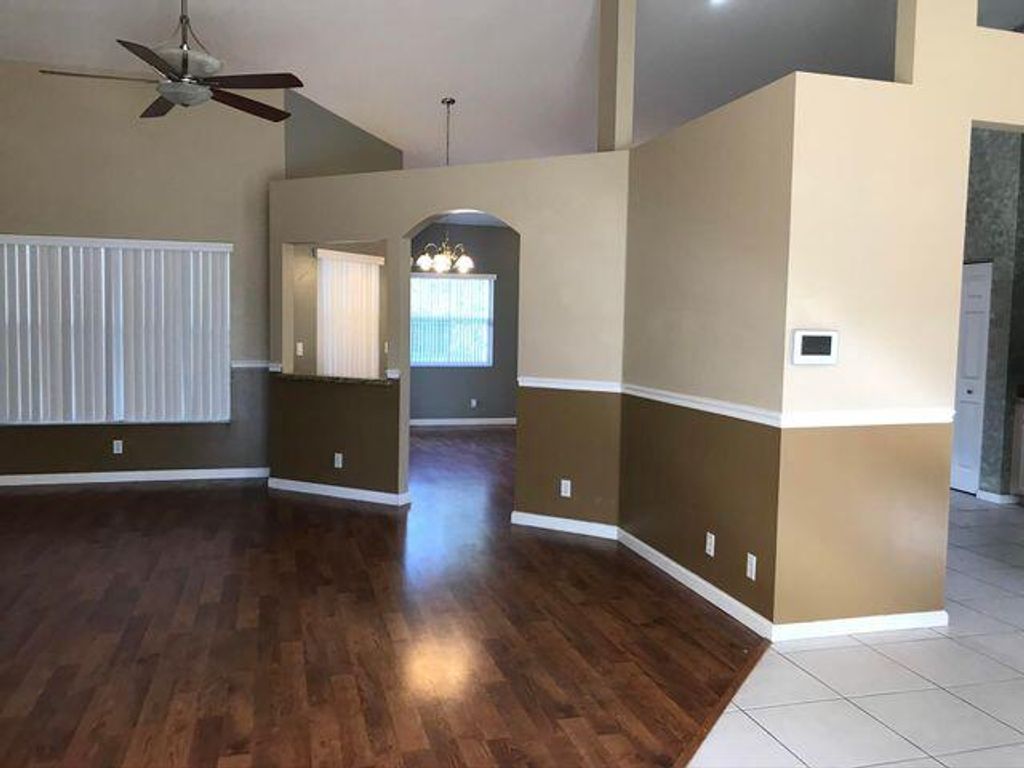 Photo of 128 Pepper Tree Crescent, Royal Palm Beach, FL 33411 (MLS # R11120271)