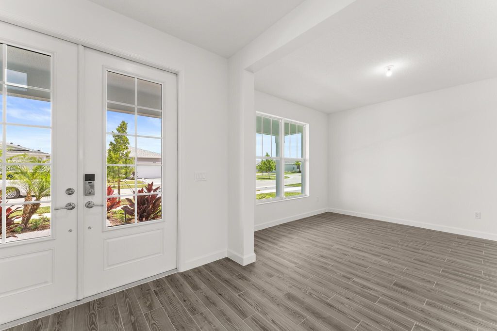 Photo of 9554 SW Indra Way, Port Saint Lucie, FL 34987 (MLS # R11127193)