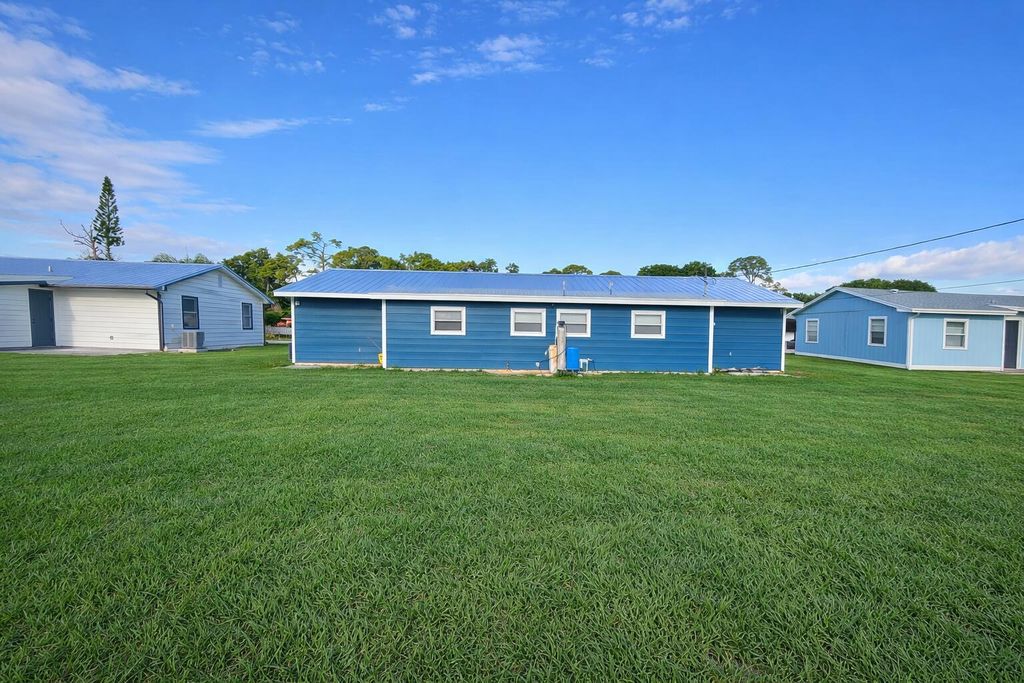 Photo of 5010 Killarney Avenue #A, Fort Pierce, FL 34951 (MLS # B26021148)