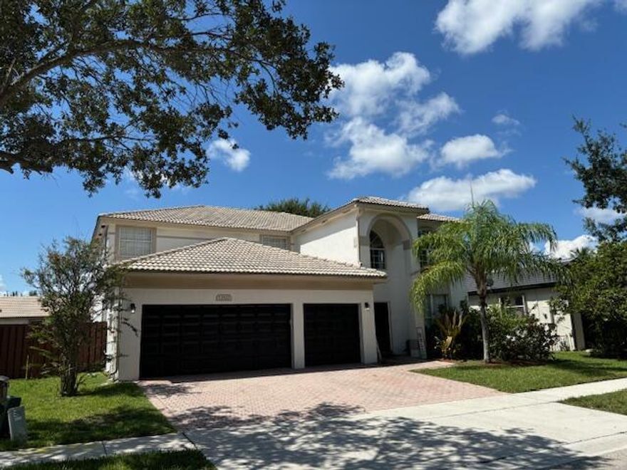 Bright and beautiful home in the exclusive Pembroke Lakes community. Radiant with natural light and fully updated, the home is a gem. Porcelain and wood flooring. Spacious master bedroom on the first floor with his and hers walk-in closets and separate shower and tub. Large family room and kitchen nook overseeing the pool. Open kitchen equipped with stainless steel appliances and kitchen island. Large pool deck with privacy fence and shrubbery. Energy efficient A/C. The second floor is equipped with a massive loft and the other three bedrooms. Pembroke Falls offers a recreational facility, tennis and basketball courts, fitness center, playground and pool. A rated schools.