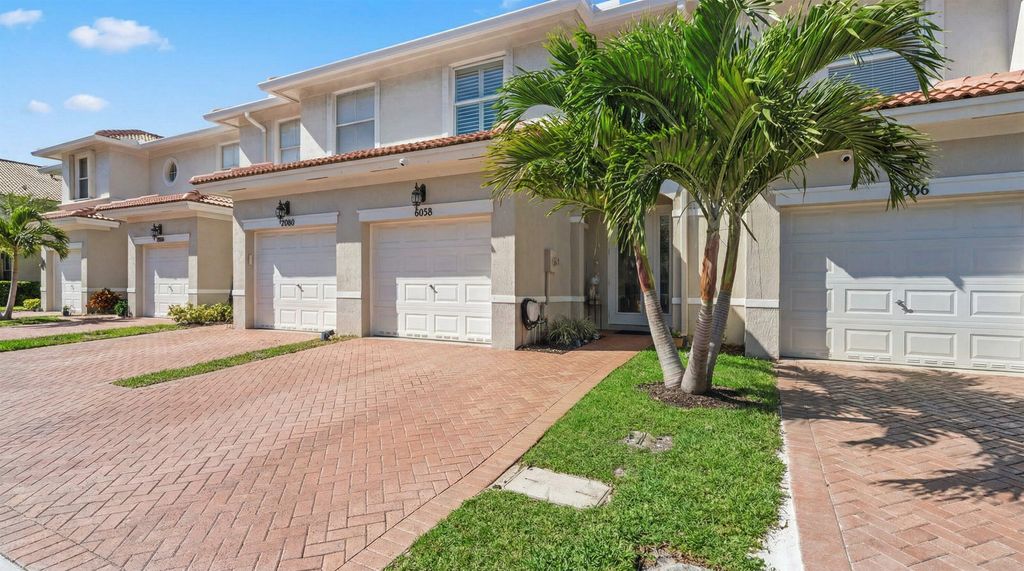 Photo of 6058 Seminole Gardens Circle, Riviera Beach, FL 33418 (MLS # R11159982)