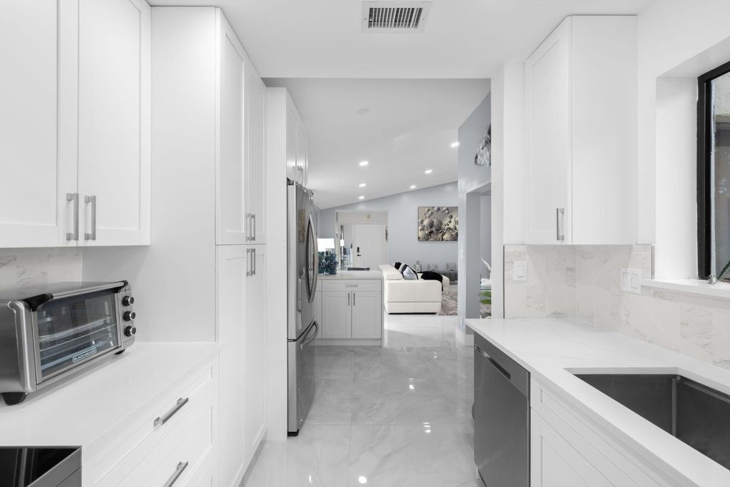 Photo of 9502 SW 1st Ct, Coral Springs, FL 33071 (MLS # F10539303)