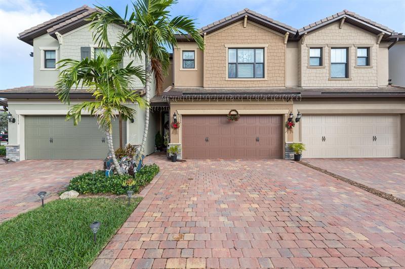Very rare find in The Fields 3 Bed+ loft / 2.5 Bath, 2 Car Garage, Townhome built in 2018. ALL AGES Gated Community. Step inside and enjoy the tastefully appointed open concept floor plan with lots of closets. The kitchen is equipped with SS appliances, granite countertops, custom light fixtures and 42''cabinets. The Living area is spacious and inviting with upgraded tile flooring and large windows which bring in lots of sunshine thru the plantation blinds. Crown molding is in every room of this home! Paver brick driveway and Patio, with a Built-in outdoor BBQ / fridge. Impact glass on 2nd floor/ shutters-ground floor, 2-great pools & amenities Tennis, Workout facility, great schools, shops nearby. E-Z access to Turnpike. NO PETS ALLOWED. Vivent Security & Ring.