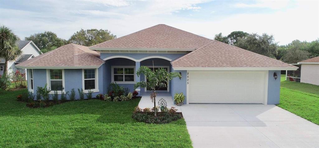 Photo of 4085 SW Mcintosh Street, Port Saint Lucie, FL 34953 (MLS # R10765831)