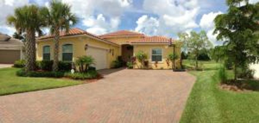 MUST SEE - Home shows like a model. This gorgeous one story home with 3 bedroom/plus den was built in 2013 in the sought after community of Porto Sol.Monaco Model.This home is on a culdesac with a large paver driveway that can park 6 cars, is partially on a lake and is on a large pie shaped lot with private backyard. Large family room with custom built-in wall unit and tray ceiling. Gourmet eat-in kitchen with tons of cabinets, stainless steel appliances, wall oven, upgraded lighting, 42'' cabinets with crown molding, plantation shutters, neutral colors and tile floors. Master Bedroom, with tray ceiling, and den/office has laminated wood flooring. Dinning Room has a tray ceiling with beautiful chandelier. Secondary bedrooms have carpet and plantation shutters. One bedroom with private bath